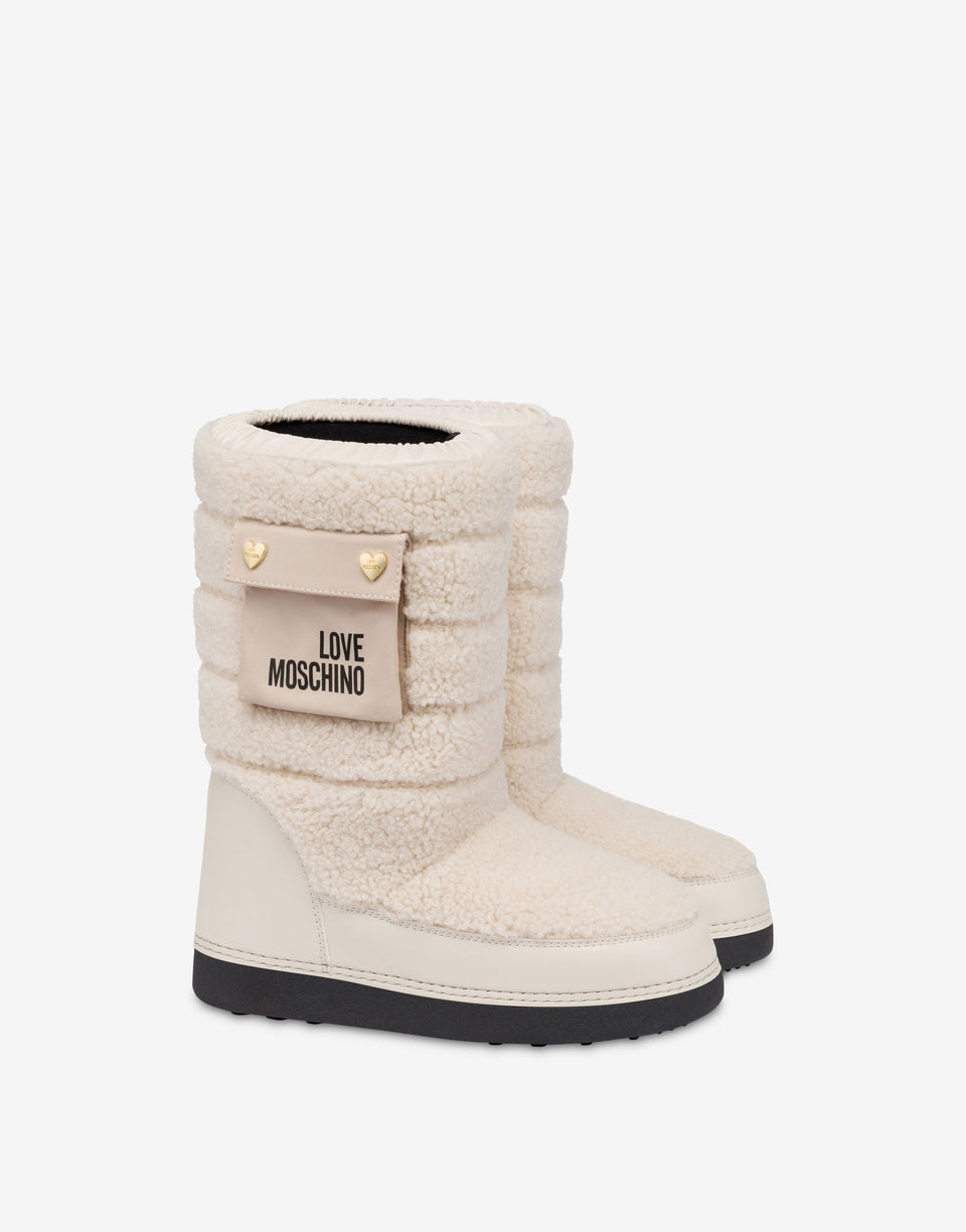 ํผํ
 ์ํํธ ํจ๋ธ๋ฆญ ์ค๋
ธ์ฐ ๋ถ์ธ  Ivory Love Moschino 0