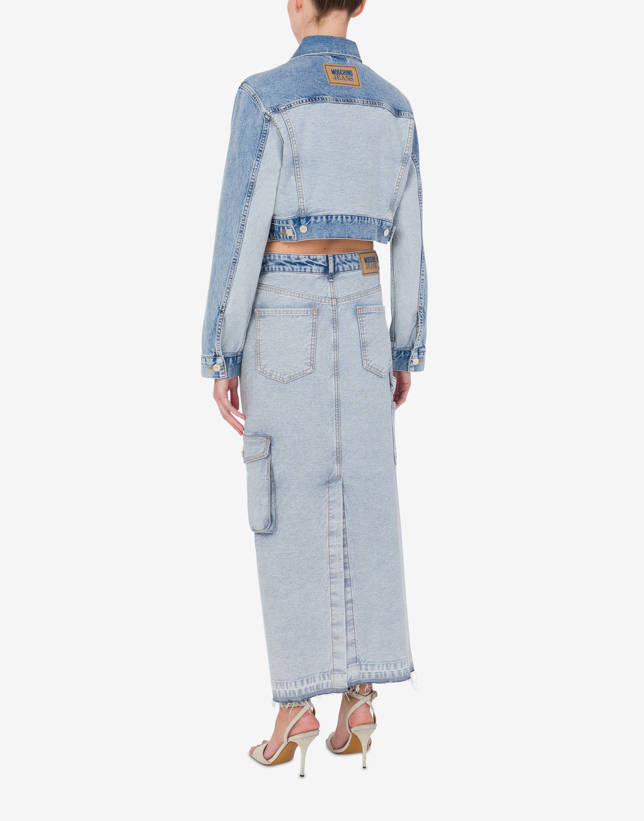 【関税&送料込】Moschino Jeans Cropped Jeans Moschino Jeans Strapless Crop Top in Multi Grey | REVOLVE