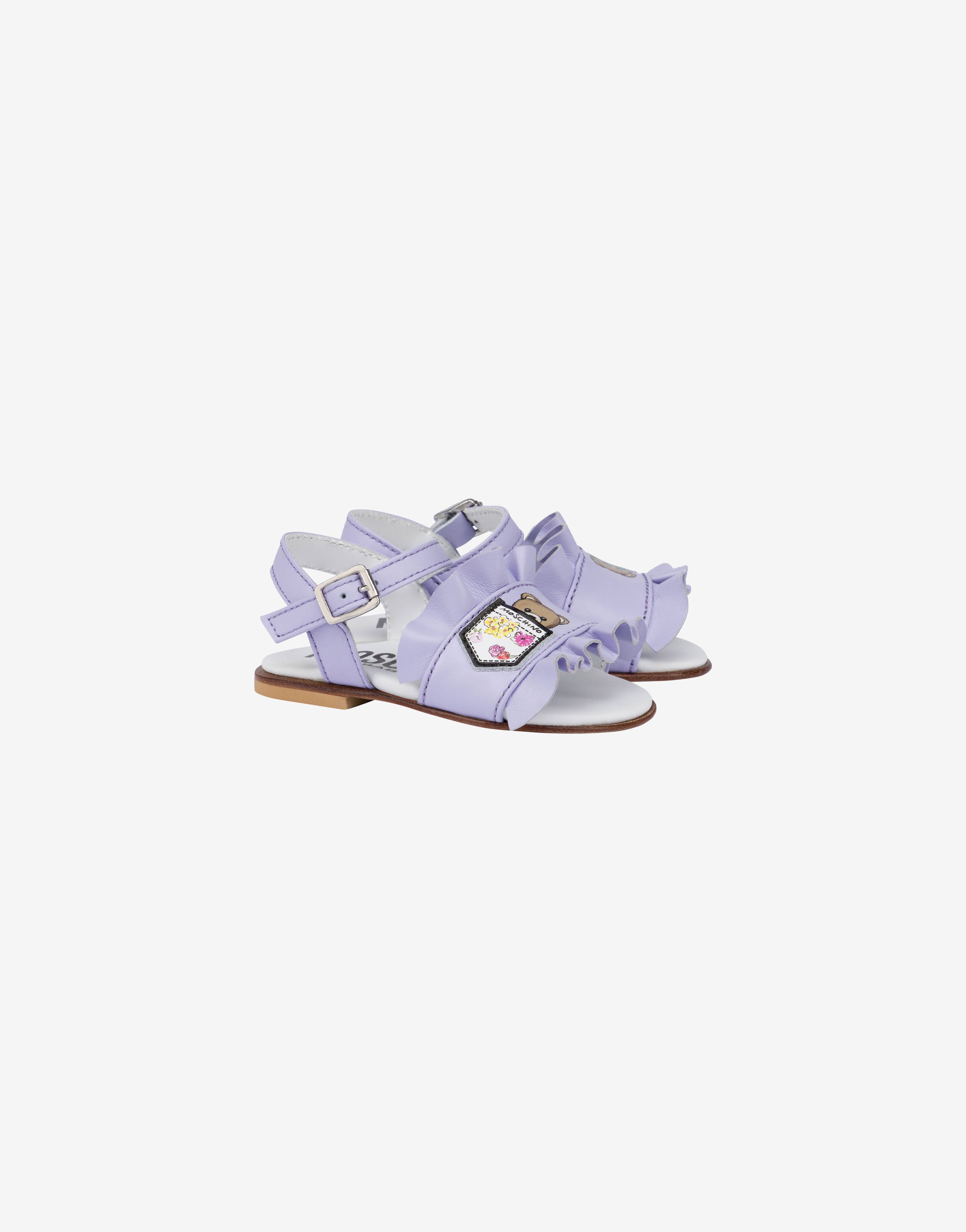 Flat leather sandals with ruffles