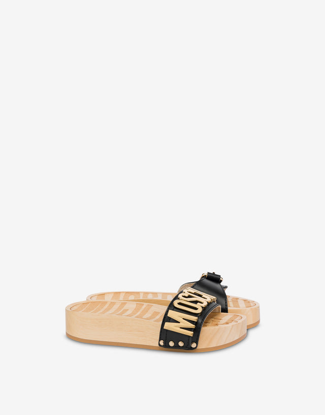 Sandalias de piel de becerro y madera Negro Moschino 0