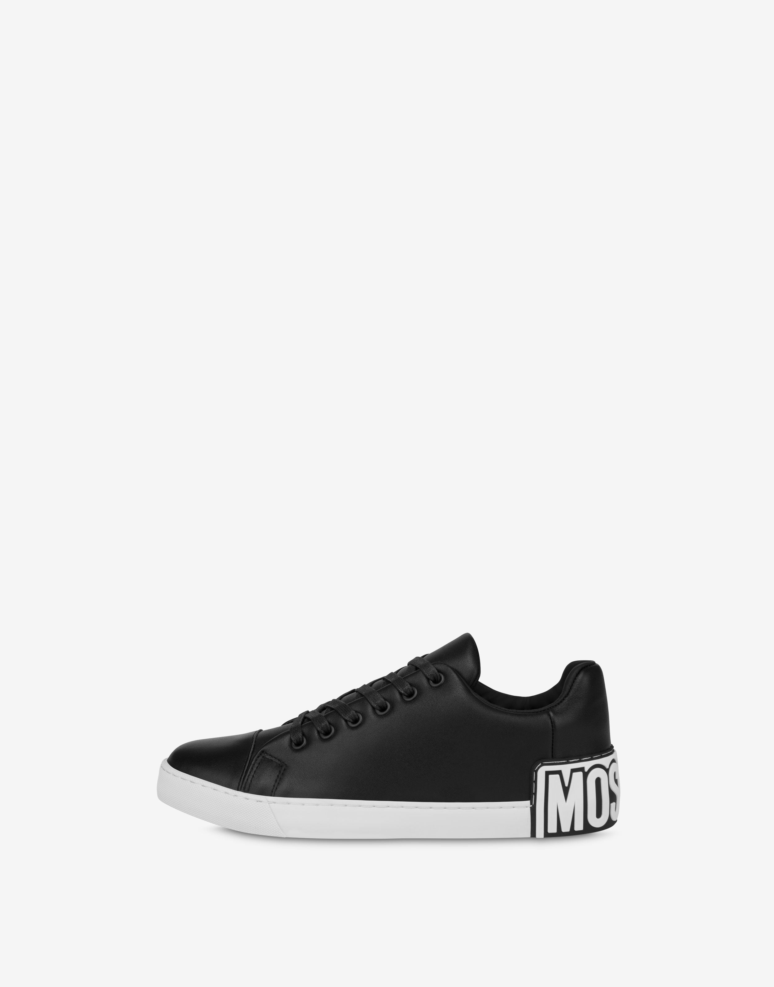 スニーカー MOSCHINO COUTURE Woman Sneakers Black MA15032G0IMK1 00A Black logo-embossed sneakers Moschino - women - MOSCHINO