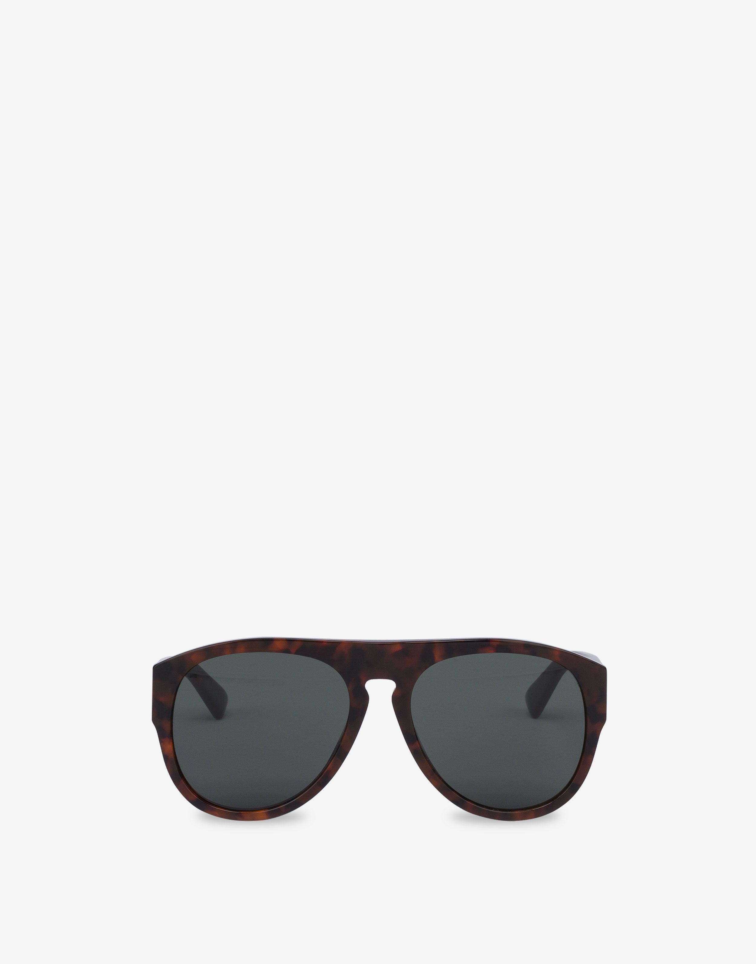 Occhiali da sole con lenti verdi