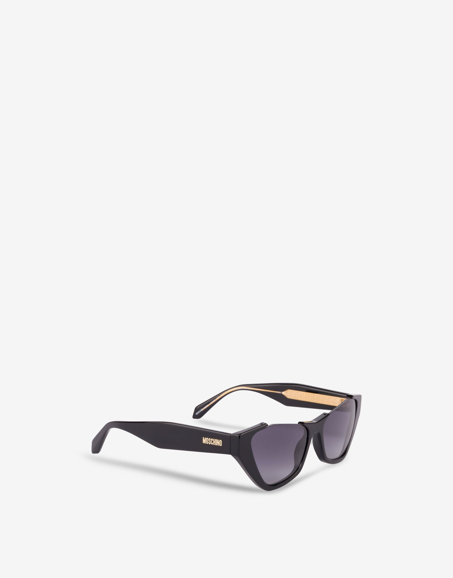 Moschino 2026: очки с декоративной булавкой — яркий тренд