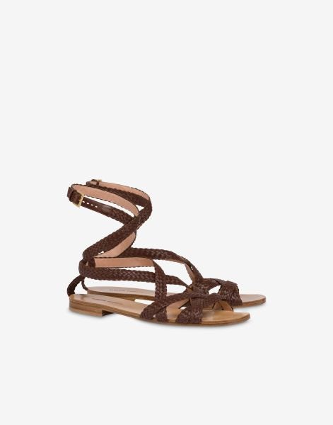 Flat sandals in braided calfskin